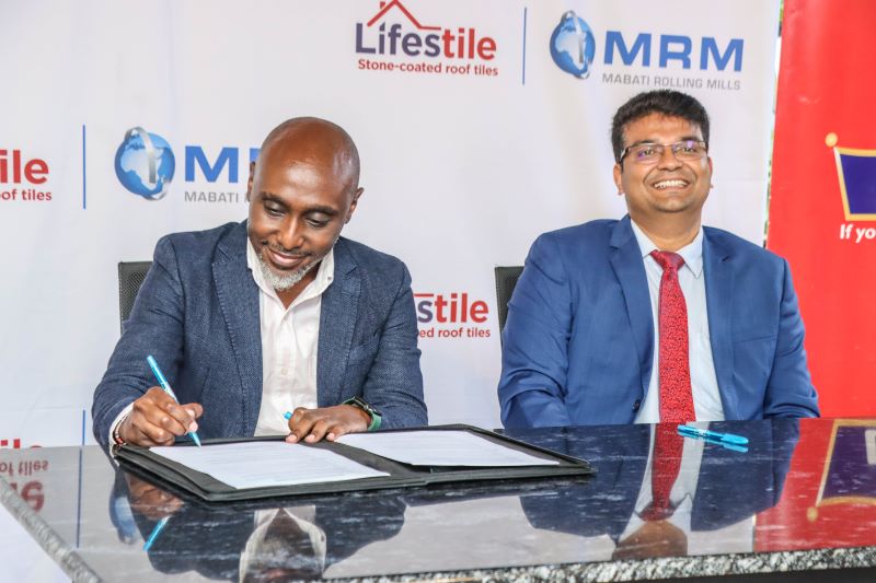 Kelvin Munyi, Group Marketing Manager at Crown Paints Kenya PLC with Geoff Anthony, Head of Sales – Building Solutions & Steel at Mabati Rolling Mills